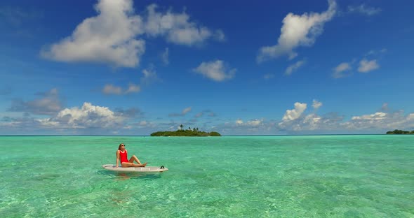 Happy couple in love dating on vacation enjoy life on beach on summer white sandy background 4K