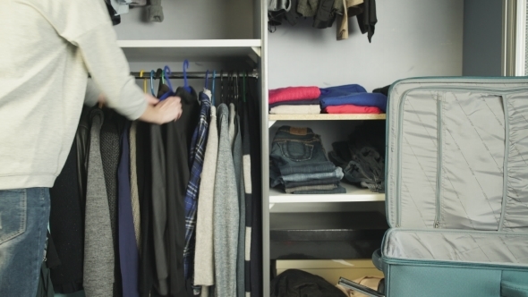 The Woman Packs a Suitcase alt