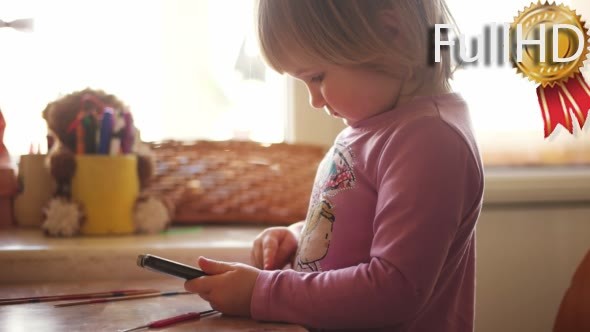 Caucasian Blonde Child Watching Cartoon