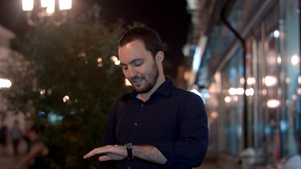 A Man Getting Ready To Flip a Coin