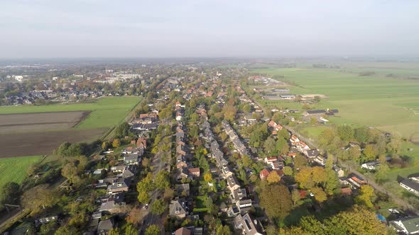 Drone over rural town - slowly backwards