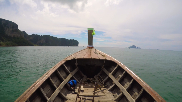 Boat Floating in Azure Sea