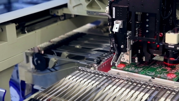 Surface Mount Technology Machine Places Elements On Circuit Boards