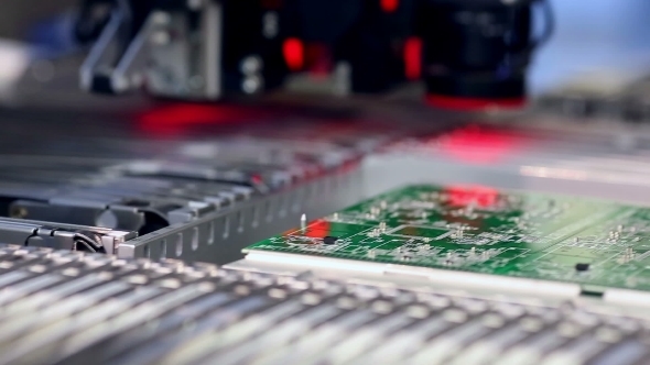 Surface Mount Technology Machine Places Elements On Circuit Boards