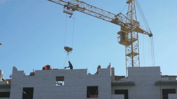 Construction Crane, Workers Work In Construction