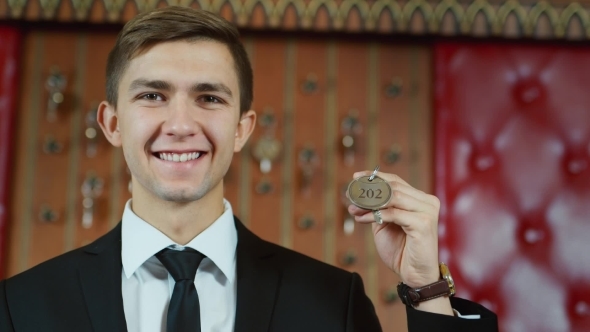 Young Worker Smiling Hotel Visitors