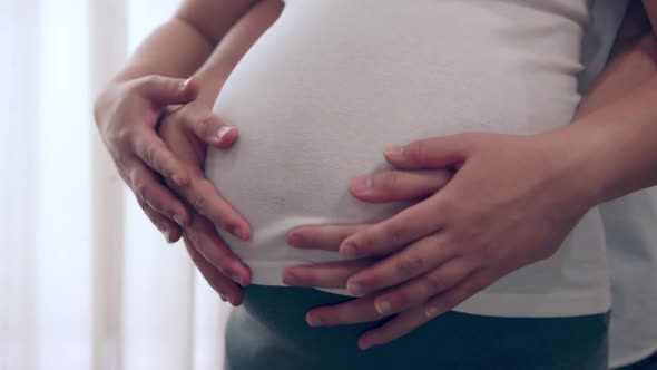 Pregnant Couple Feels Love and Relax at Home