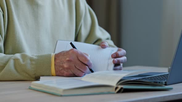 Unrecognizable Mature Man Sit at Workplace Professor Preparing Lecture for Students Remote