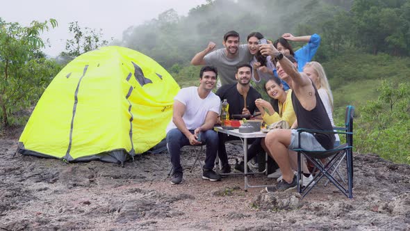 Happy group of friends taking a photo backpack to travel adventure in summer.