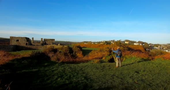 Male hiker hiking in countryside 