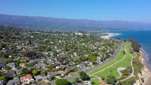 Santa Barbara beach and cliff drone panning right.