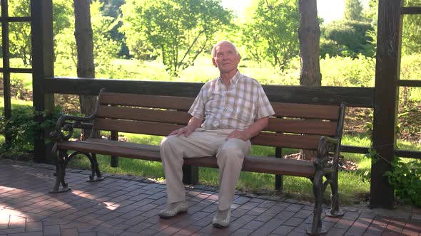 Senior Man on Park Bench.