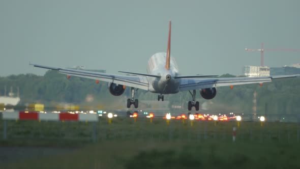 Passenger Jetliner Landing In Amsterdam Airport.