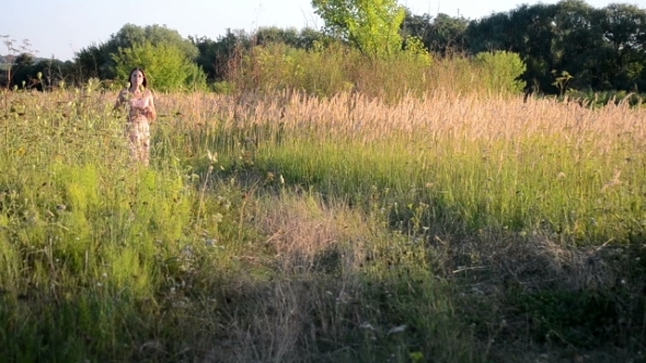 Girl Walking On a Dirt Road, Grassy