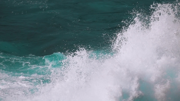 Ocean Waves Breaking On Rock