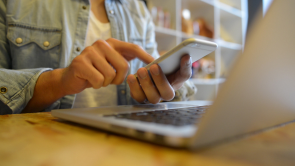 Man Using Smartphone alt
