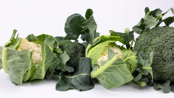 Organic Broccoli and Cauliflours on White