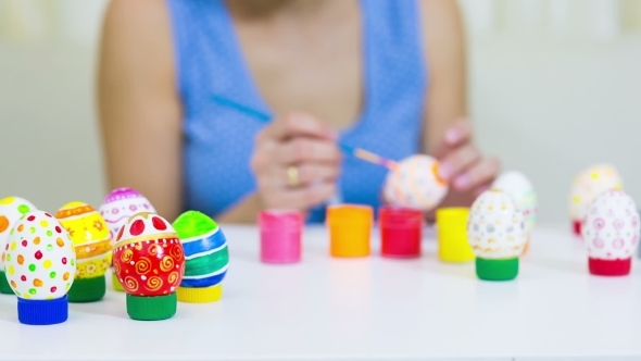 Woman Painting Easter Egg