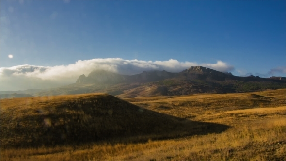 Mountains Peaks In Clouds