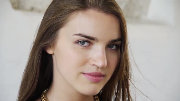 Portrait Of Young Woman Looking At Camera