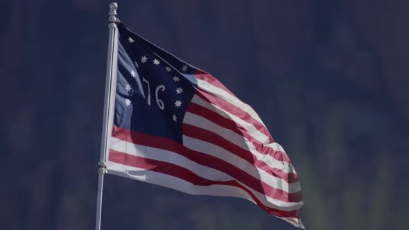 American 76 flag vigorously flapping in the slow motion wind