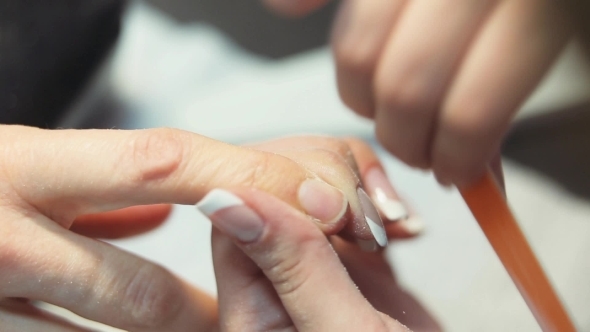 Treatment Of The Nails Using a Nail File