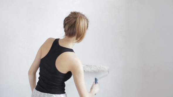 Woman Painting Wall