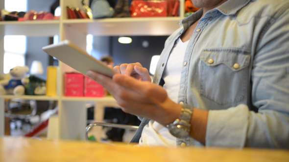 Man Typing, while Holding Tablet PC alt