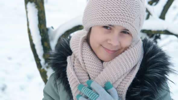 Snowy Forest and Smiling Teen