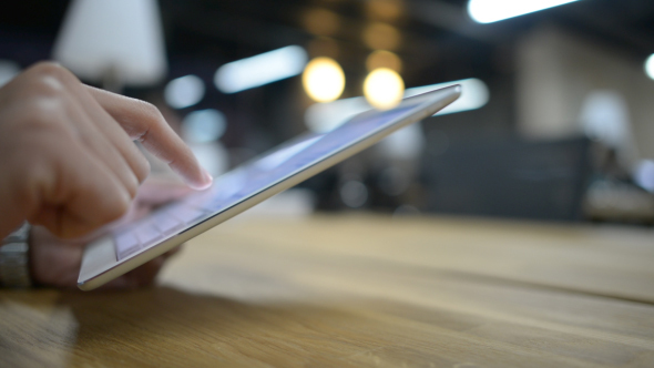 Designer Working Online on Tablet alt