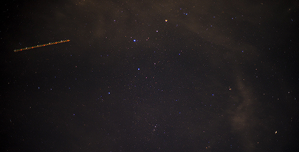 Night Sky with Stars and Clouds