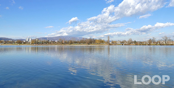 Lake and Mountain with City Panorame