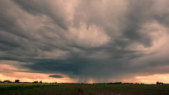 Time lapse of dramatic storm clouds moving across the landscape