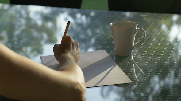 Writing a letter in the Sunshine