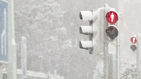 Red Light Shining During Blizzard alt