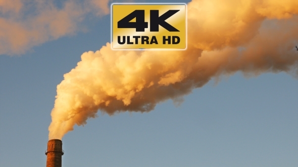 Factory Plant Smoke Stack Over Blue Sky Background alt