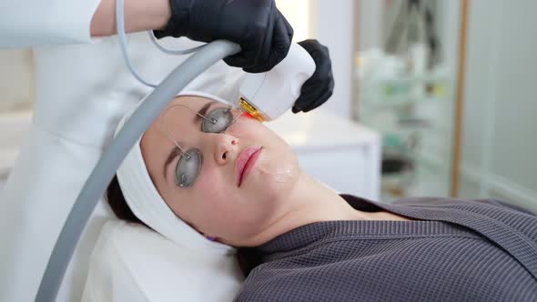 Rejuvenating Face Skin By Modern Phototherapy Method in Cosmetology Clinic