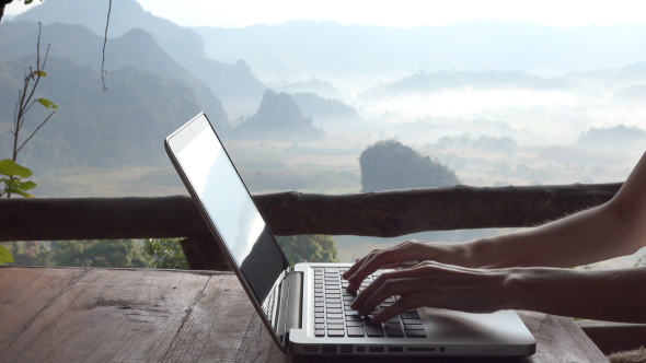 Typing On Computer Laptop In Holiday alt