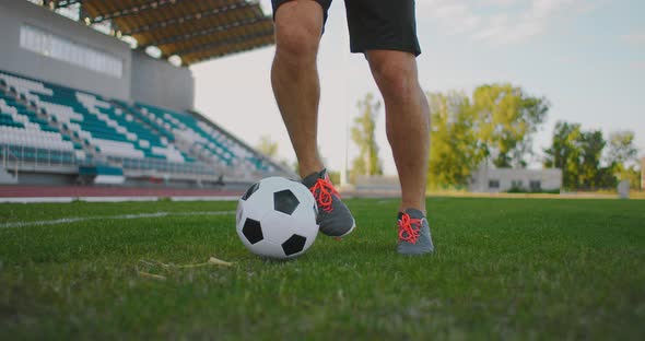 Soccer Player Show Footwork and Soccer Player Kicking and Shooting Ball on Goal in Slow Motion