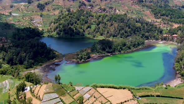 Cloud shadowe on Lake Warna in Dieng Plateau, Central Java Indonesia, aerial