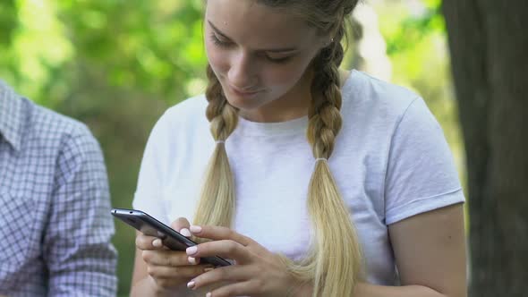 Teenagers Using Smartphones, Ignoring Each Other, Concept of Internet Addiction