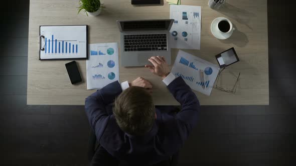 Young Tired Male Finishing Project and Closing Laptop, Depressed Businessman