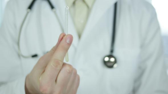Doctor Gives Patient A Pipette