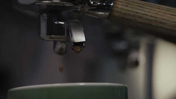Coffee Machine Pouring Espresso In Cup