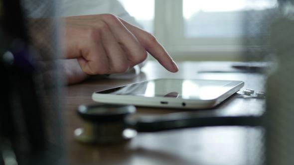 Doctor With Tablet alt