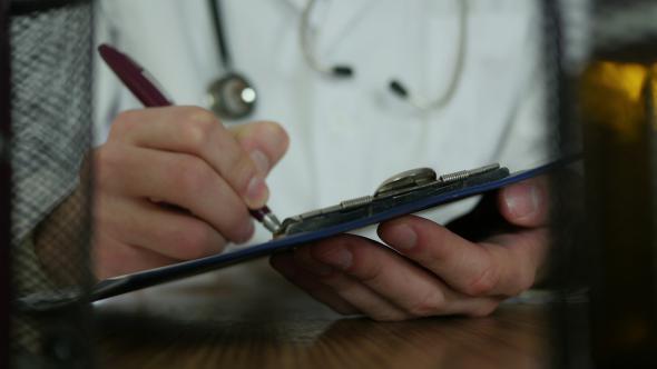 Doctor Medical Record In Hospital alt