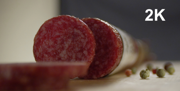 Slices Of Salami Roll On The Table