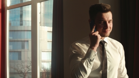Stylish Businessman Talking On The Phone