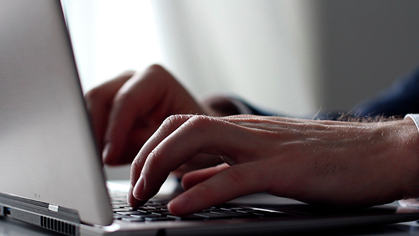 Man Working On Laptop