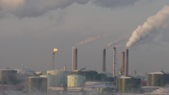 A Factory With Blowing Smoke From The Chimney, Winter